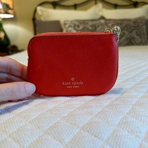 NWOT Kate Spade coin purse in coral red!